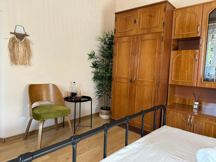 Surorii — wardrobe and seating area